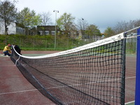 plaatsen tennisnet